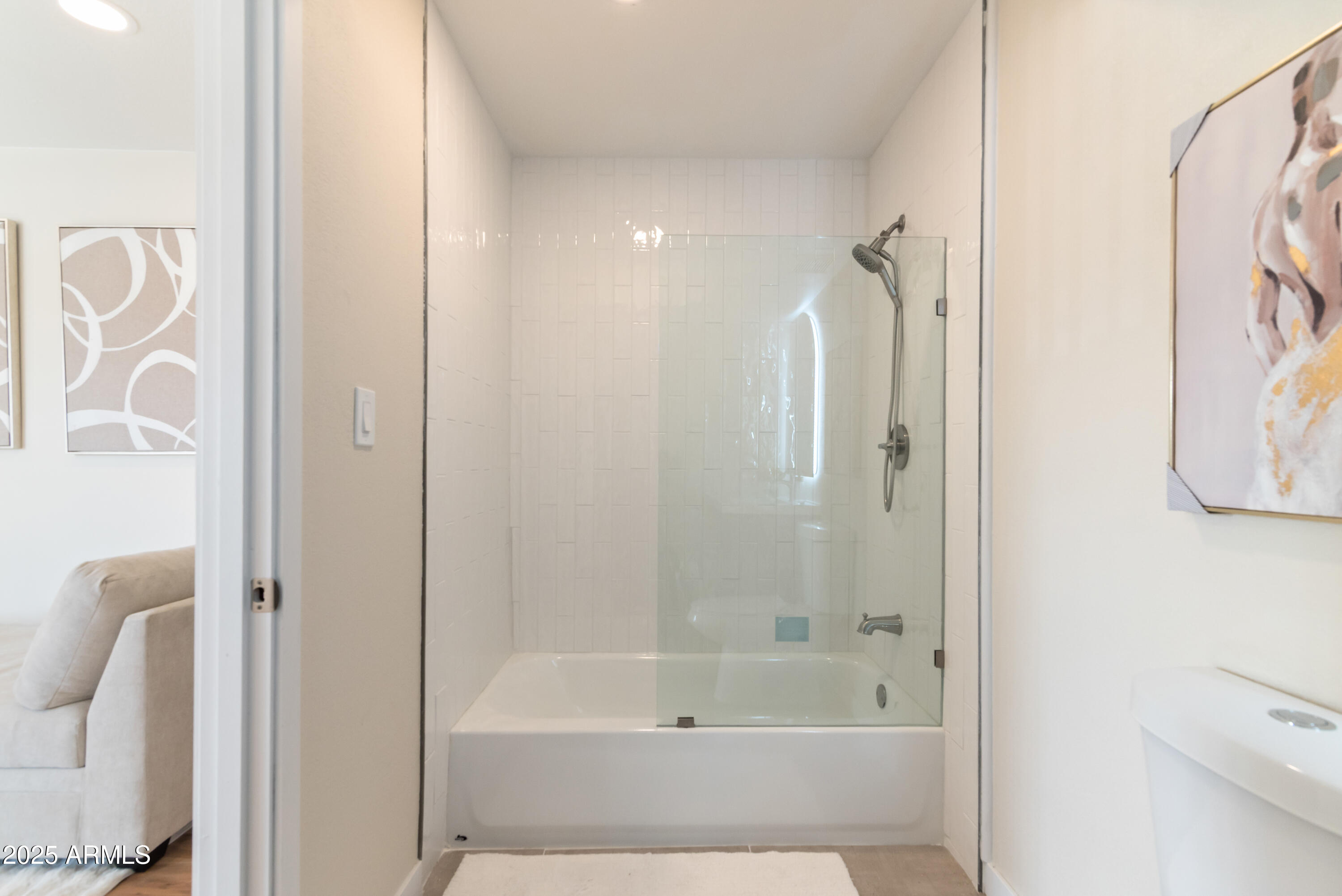 8787 East Mountain View Road, Unit 2101 Scottsdale, AZ 85258 - Photo 22 of 39 a bathroom with a bathtub and a shower