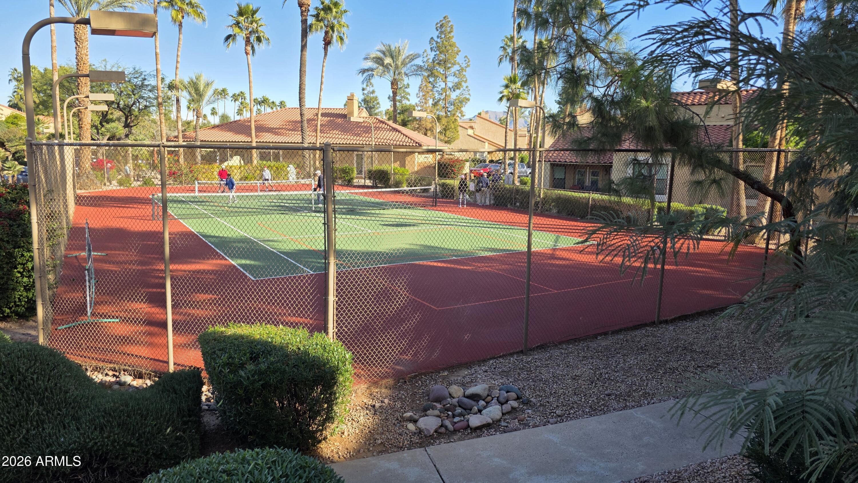 8787 East Mountain View Road, Unit 2101 Scottsdale, AZ 85258 - Photo 34 of 39 a view of a backyard with sitting area