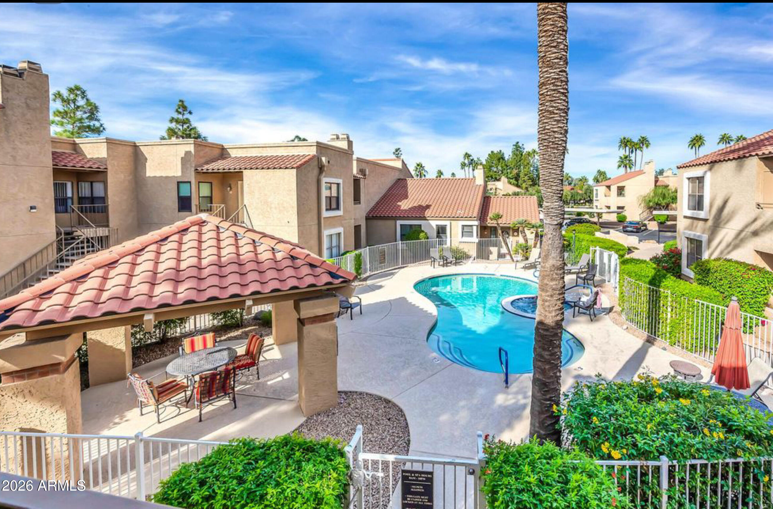 8787 East Mountain View Road, Unit 2101 Scottsdale, AZ 85258 - Photo 35 of 39 an aerial view of multiple houses with yard
