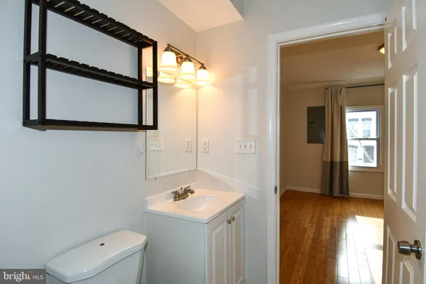 a kitchen with stainless steel appliances granite countertop a refrigerator a sink and a stove