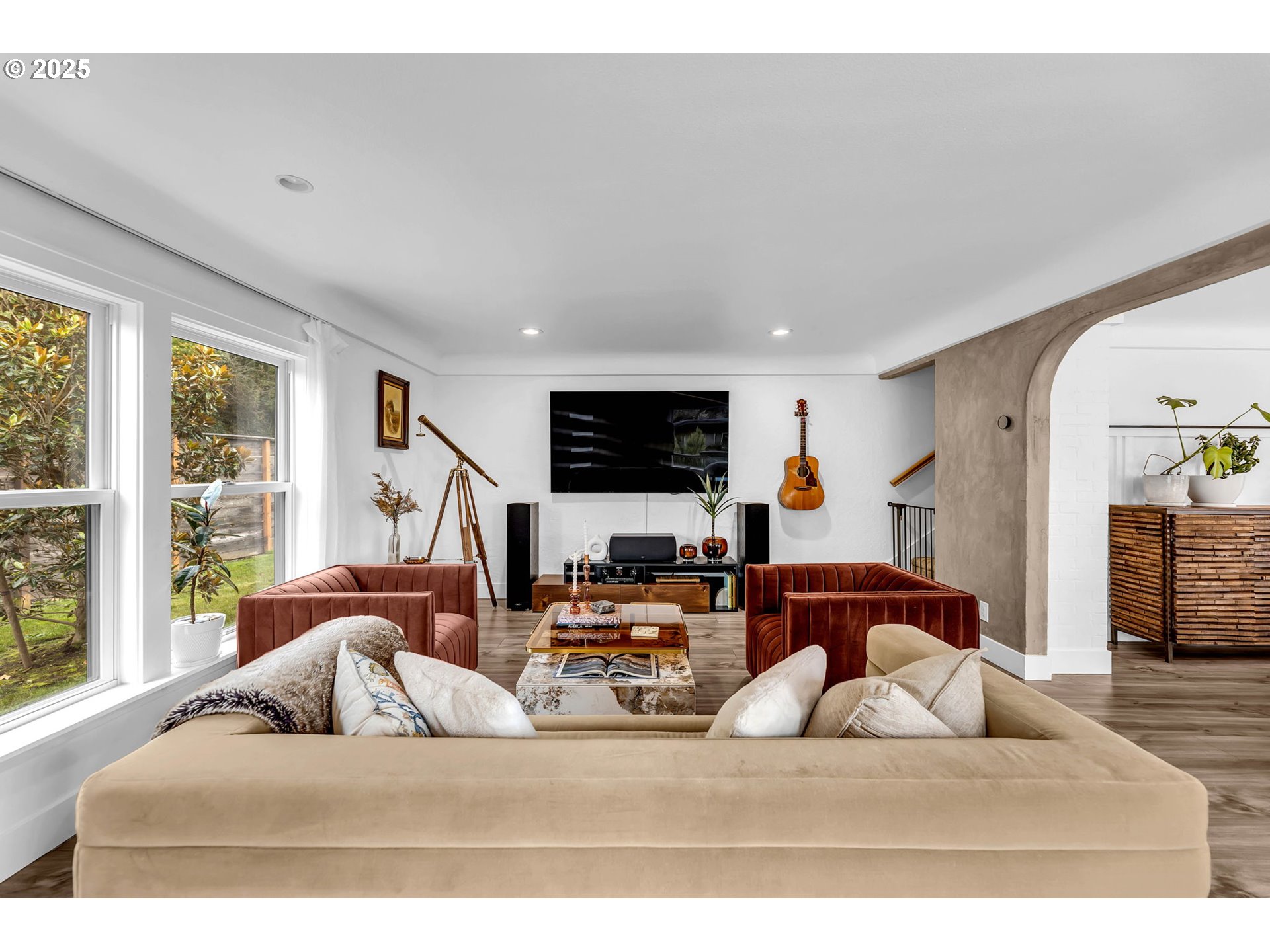 205 South Hillhurst Road Ridgefield, WA 98642 - Photo 11 of 43 a living room with furniture and a flat screen tv