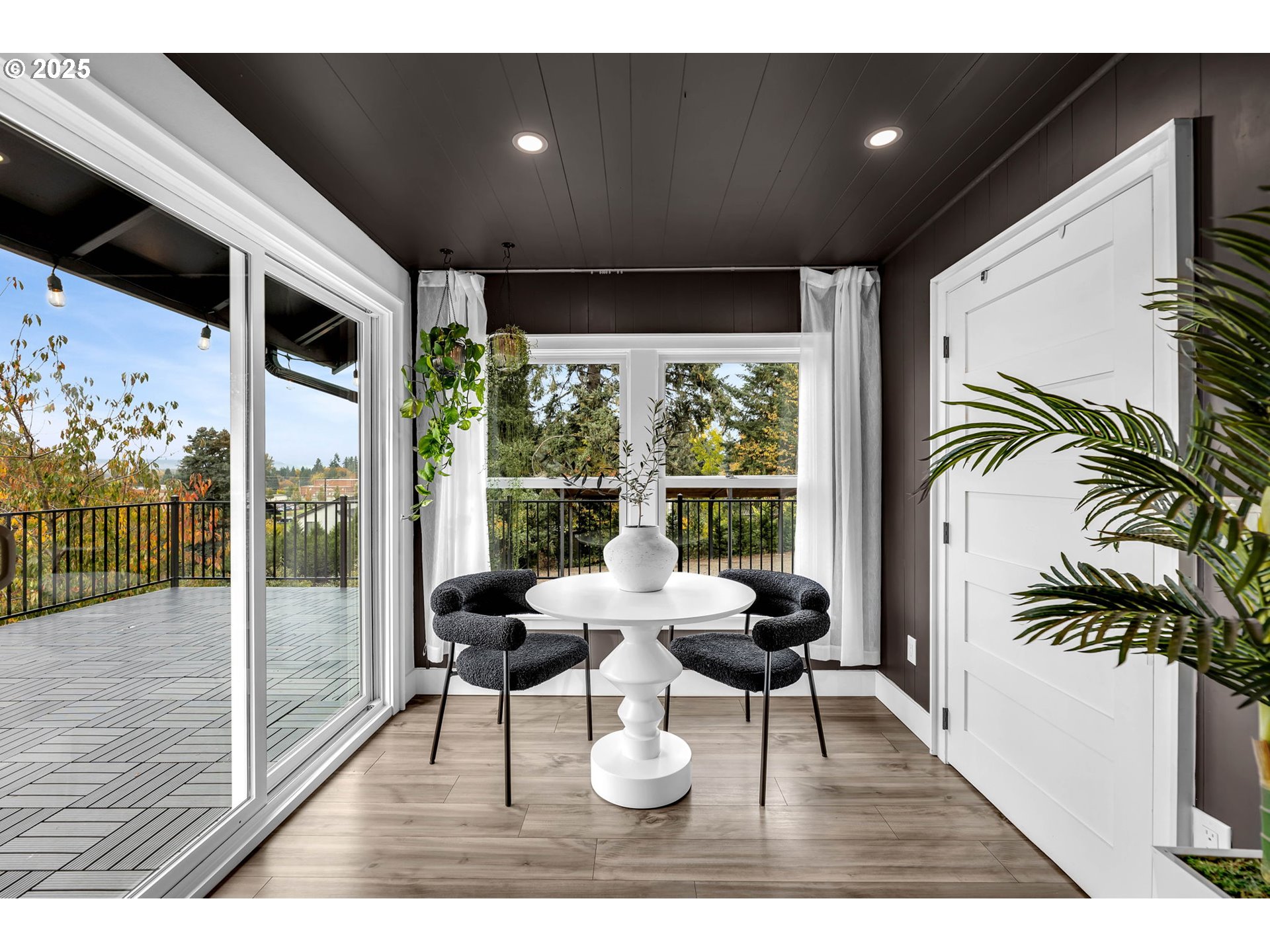 205 South Hillhurst Road Ridgefield, WA 98642 - Photo 24 of 43 a dining room with furniture and wooden floor