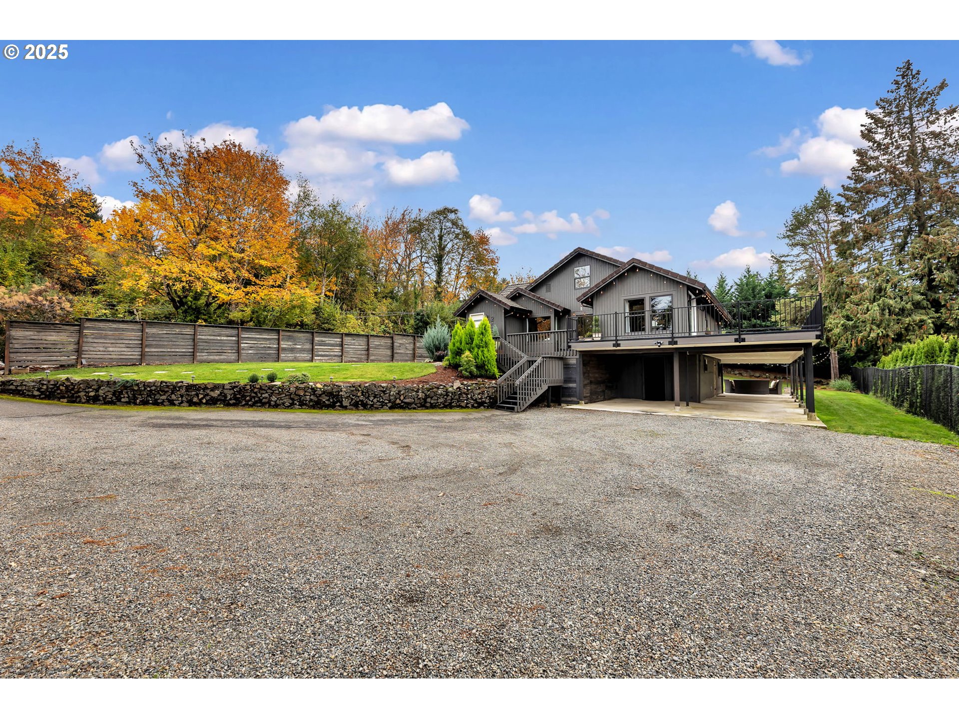205 South Hillhurst Road Ridgefield, WA 98642 - Photo 3 of 43 a view of a house with a yard