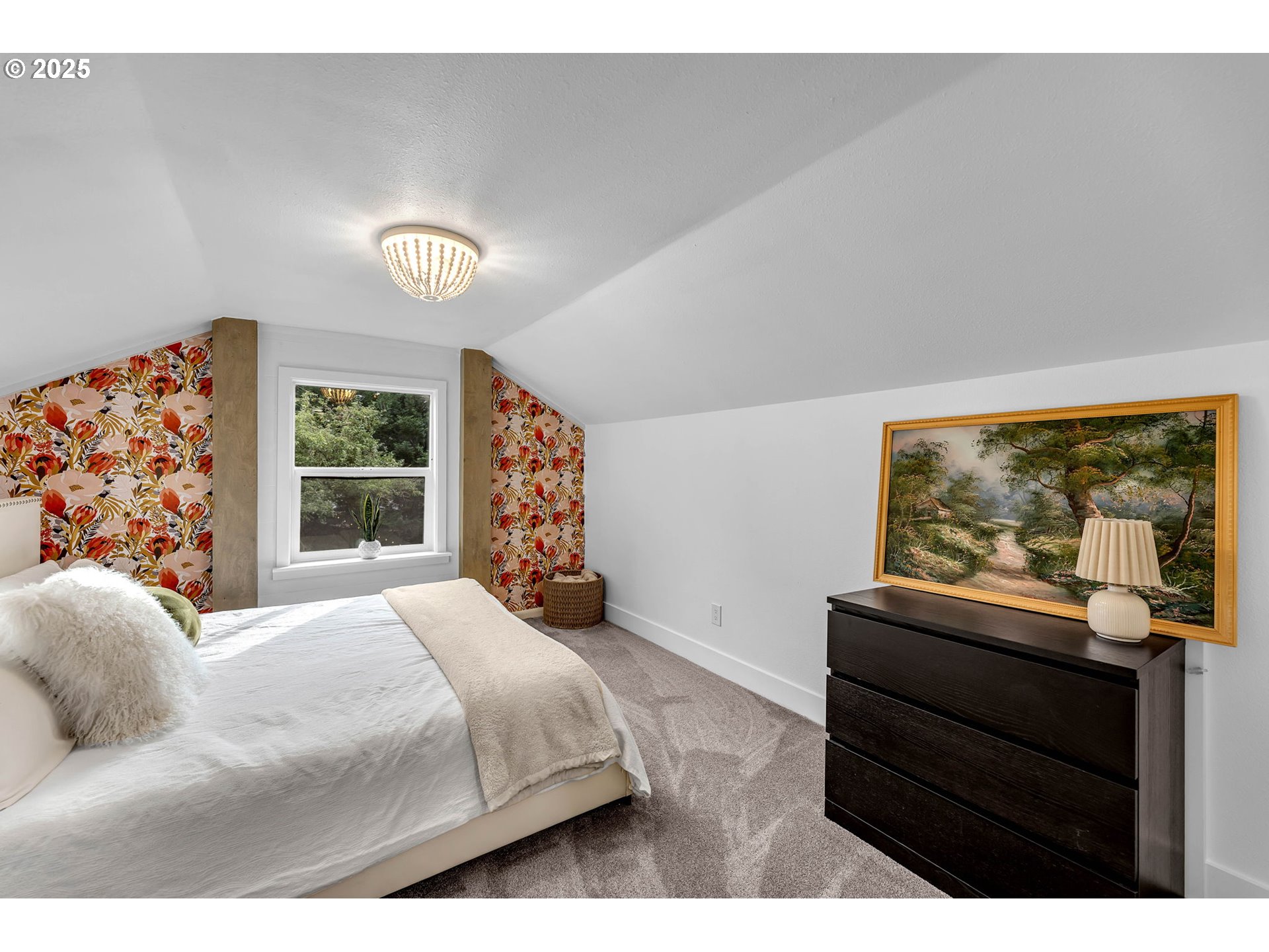 205 South Hillhurst Road Ridgefield, WA 98642 - Photo 32 of 43 a bedroom with a bed and a dresser next to a window