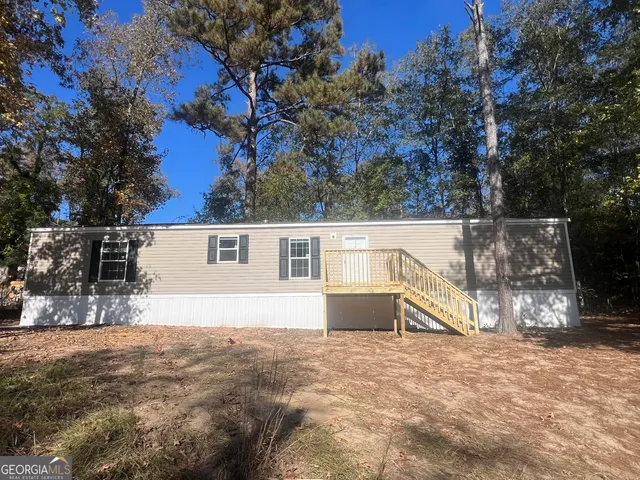 a kitchen with a refrigerator stove and sink