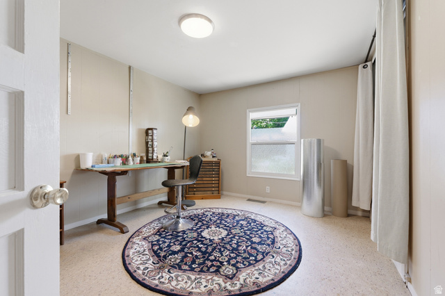365 North Main Street Fillmore, UT 84631 - Photo 46 of 51 Bright room featuring a window with frosted lower pane, light-colored walls, and a ceiling-mounted light fixture