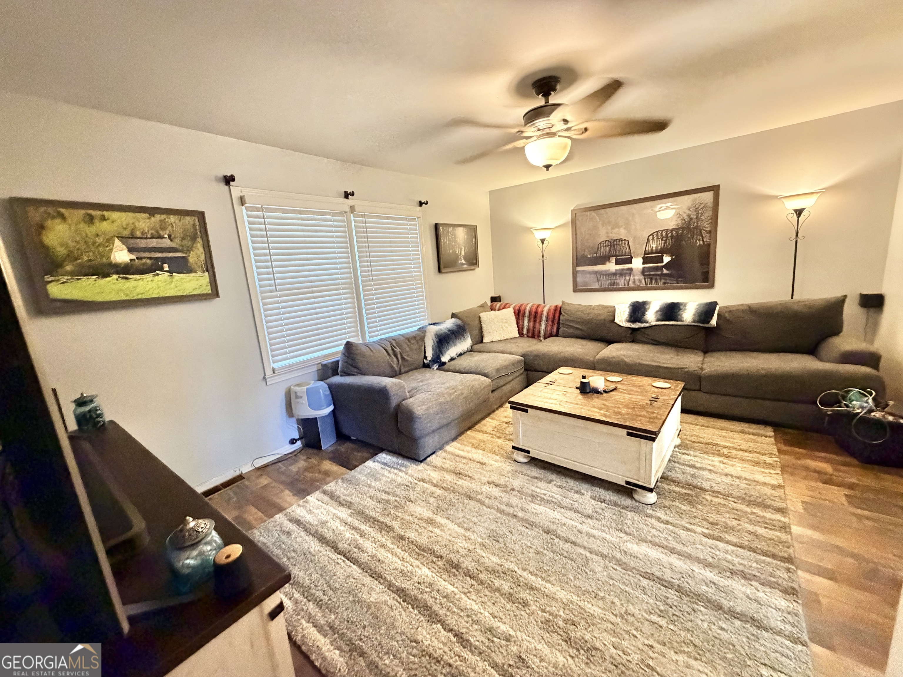 326 Remsdale Road Toccoa, GA 30577 - Photo 16 of 33 a living room with furniture and a large window