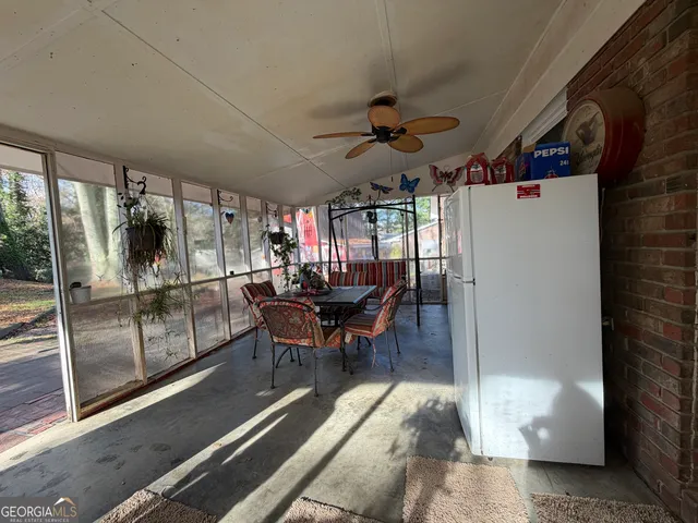 a dining room with furniture
