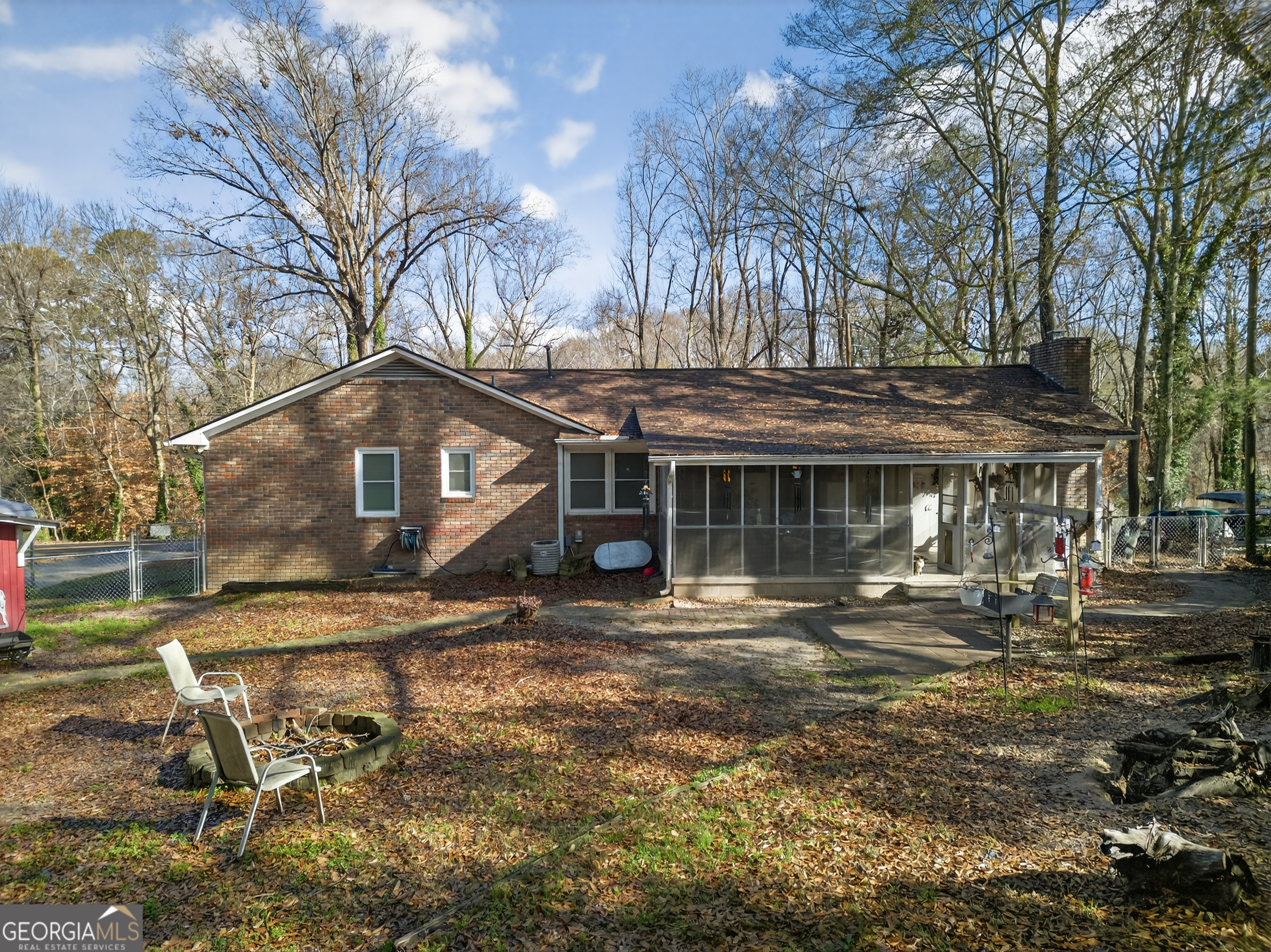 326 Remsdale Road Toccoa, GA 30577 - Photo 27 of 33 a front view of house with yard outdoor seating and covered with trees