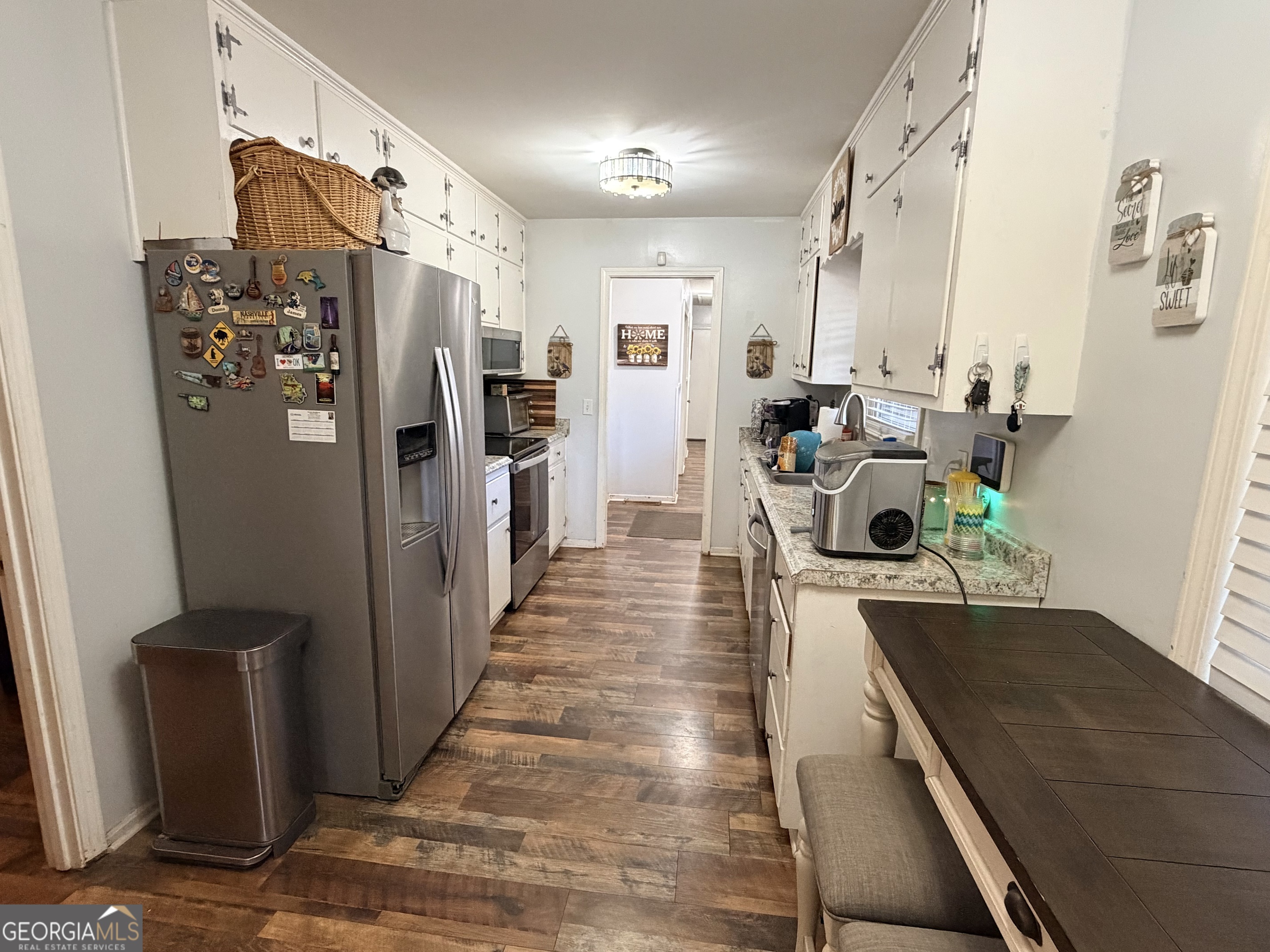 326 Remsdale Road Toccoa, GA 30577 - Photo 6 of 33 a kitchen with stainless steel appliances granite countertop a refrigerator and a stove