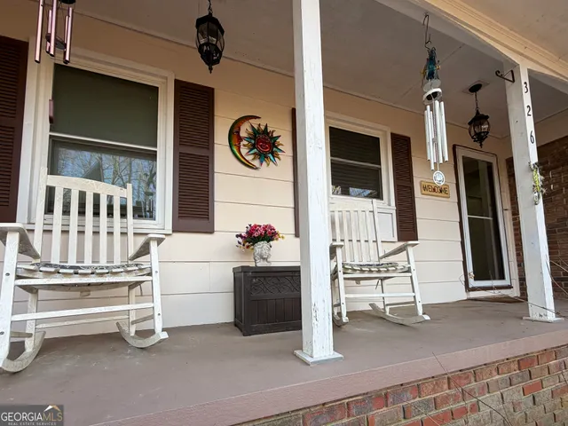 a bedroom with furniture and window