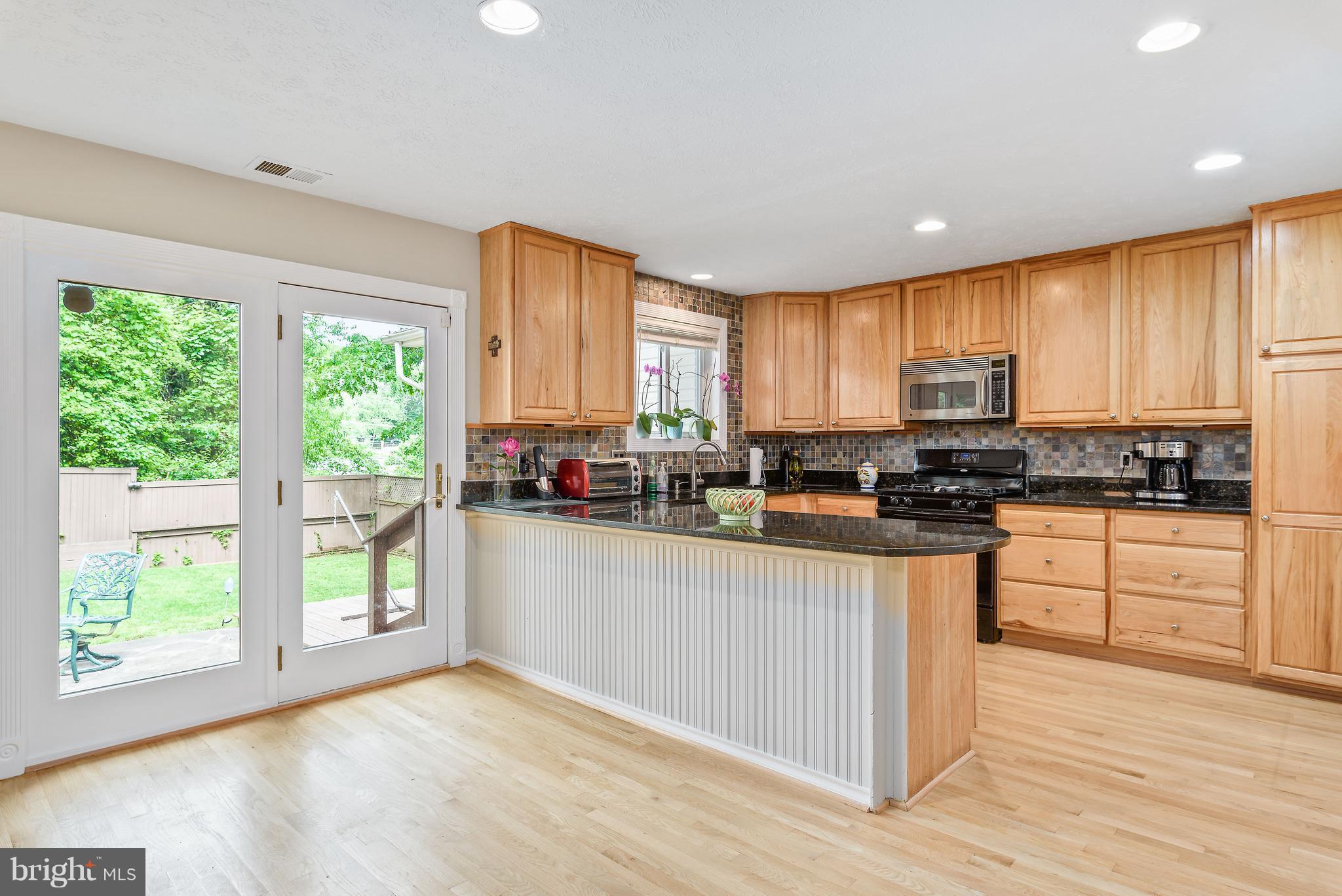 5533 Callander Drive Springfield, VA 22151 - Photo 5 of 21 French door to patio and backyard