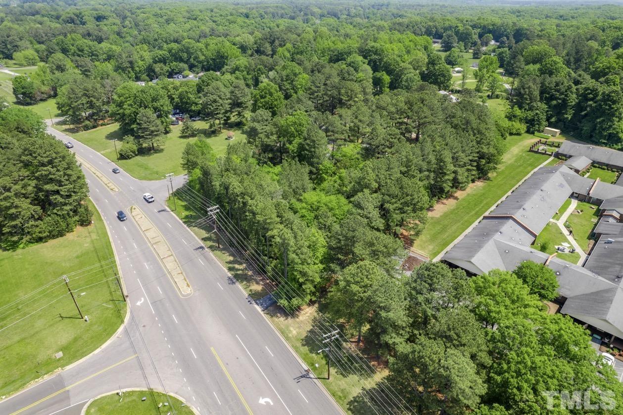102 Mickey Circle Durham, NC 27712 - Photo 14 of 16 an aerial view of a house with a yard