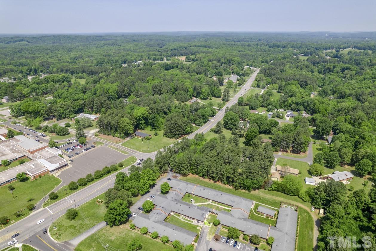 102 Mickey Circle Durham, NC 27712 - Photo 15 of 16 an aerial view of a city with lots of residential buildings