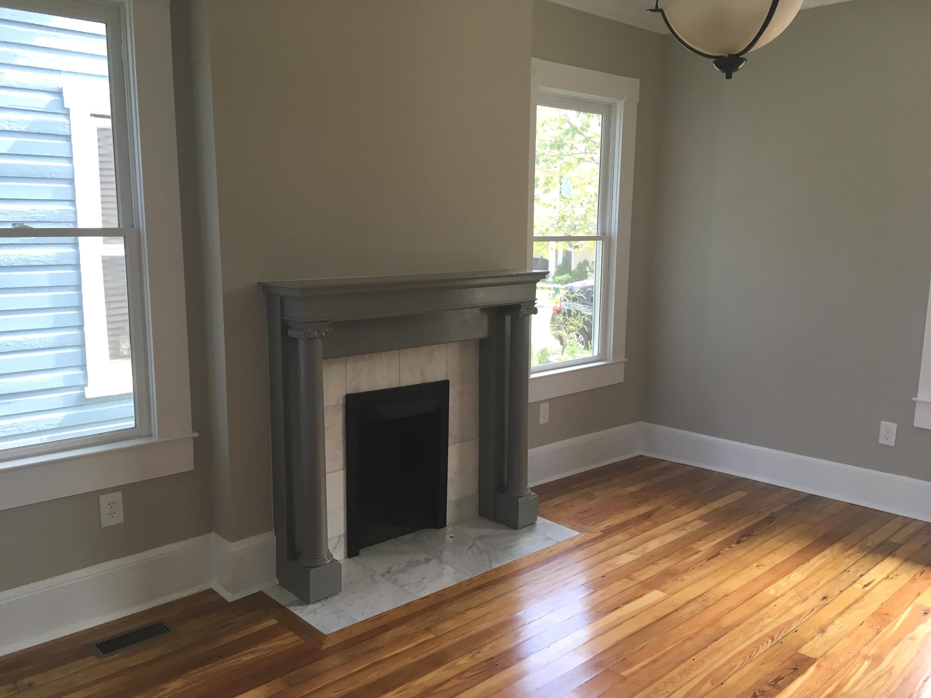 415 Day Avenue Southwest Roanoke, VA 24016 - Photo 6 of 15 a view of an empty room with wooden floor and a window