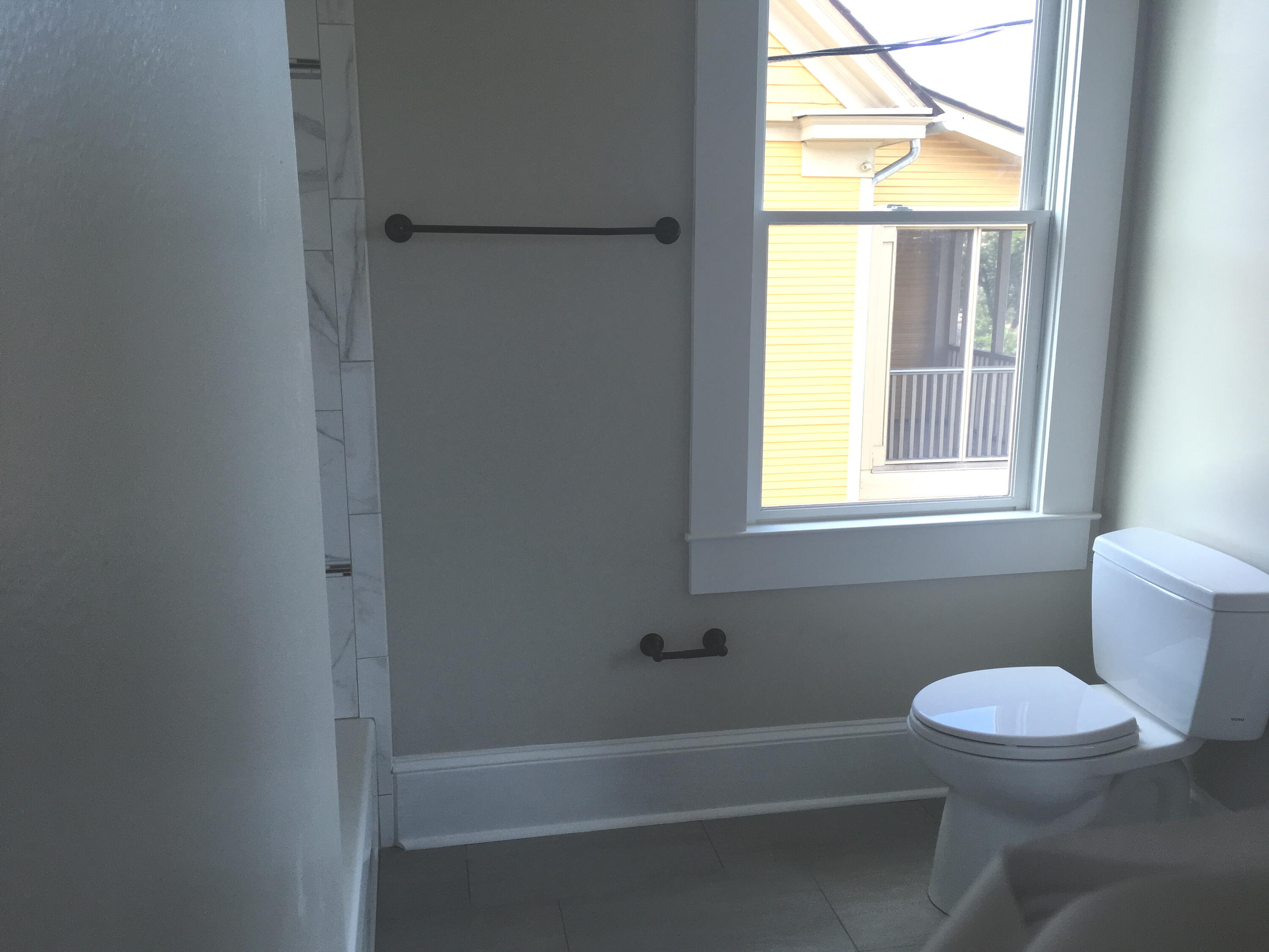 415 Day Avenue Southwest Roanoke, VA 24016 - Photo 8 of 15 a bathroom with a toilet and a bathtub
