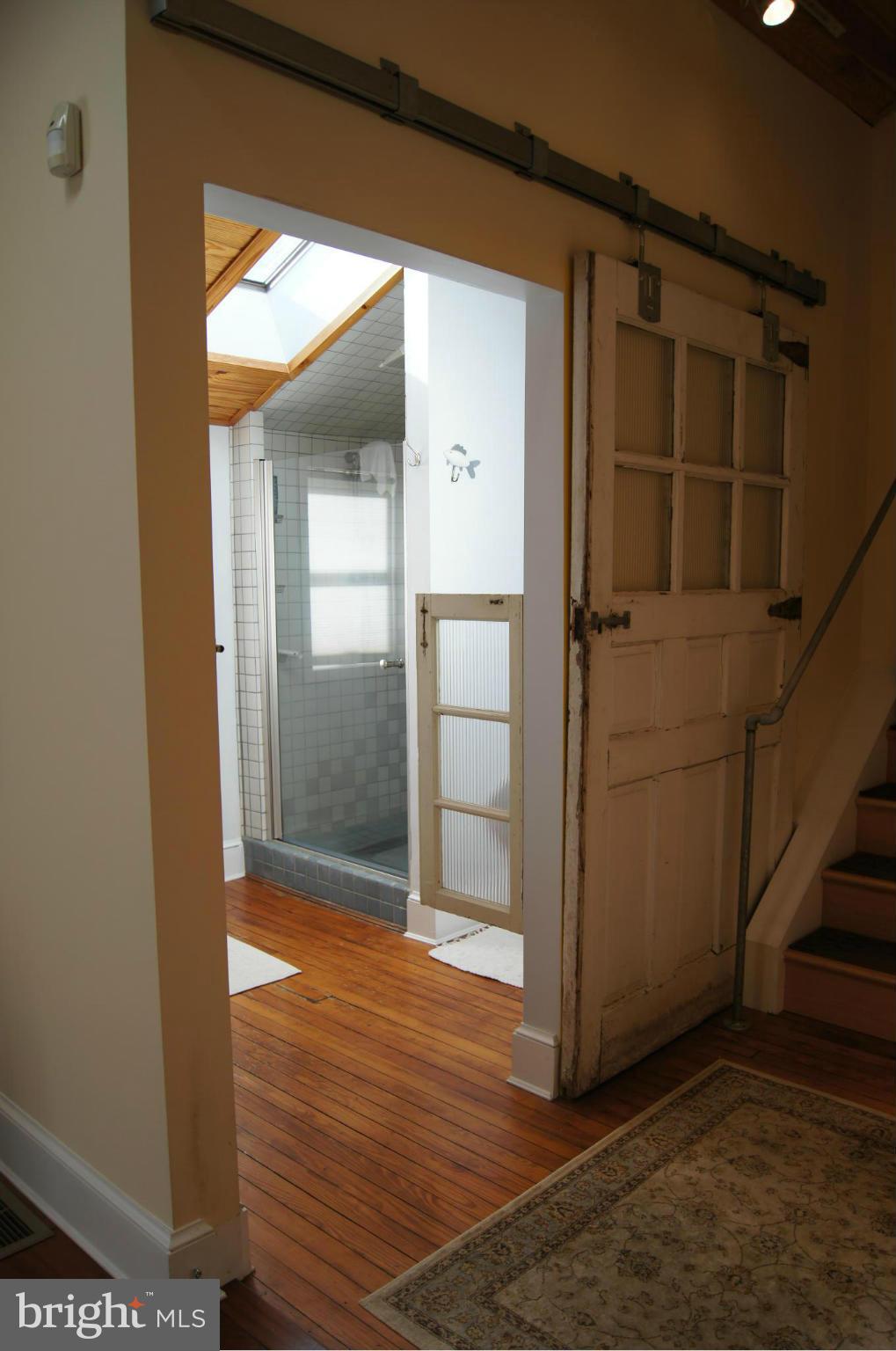 6521 Maplewood Road Baltimore, MD 21212 - Photo 15 of 30 Exterior view of full first floor bath. Barn door.