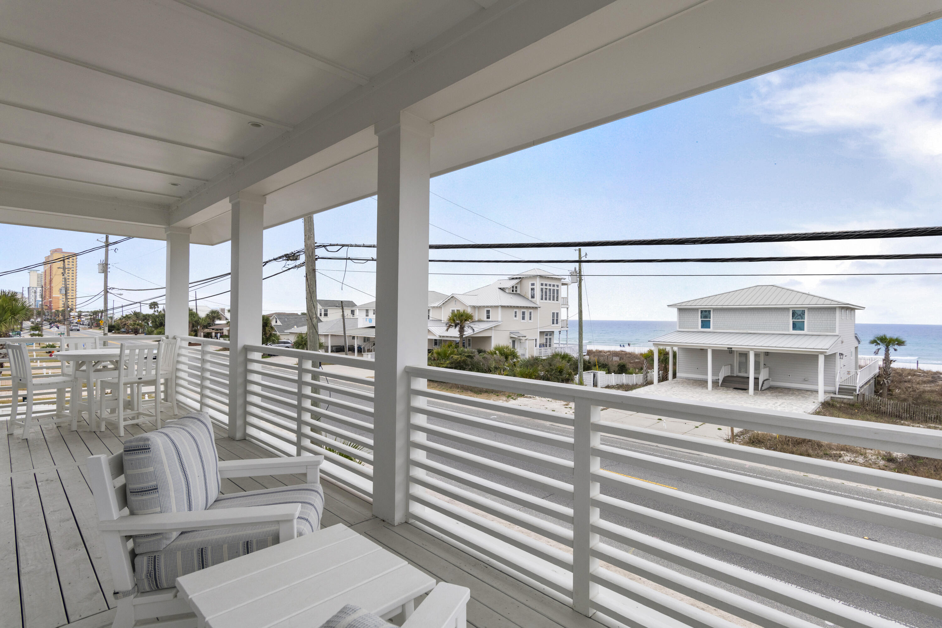 16416 Front Beach Road Panama City Beach, FL 32413 - Photo 2 of 46 a view of a living room and balcony with furniture