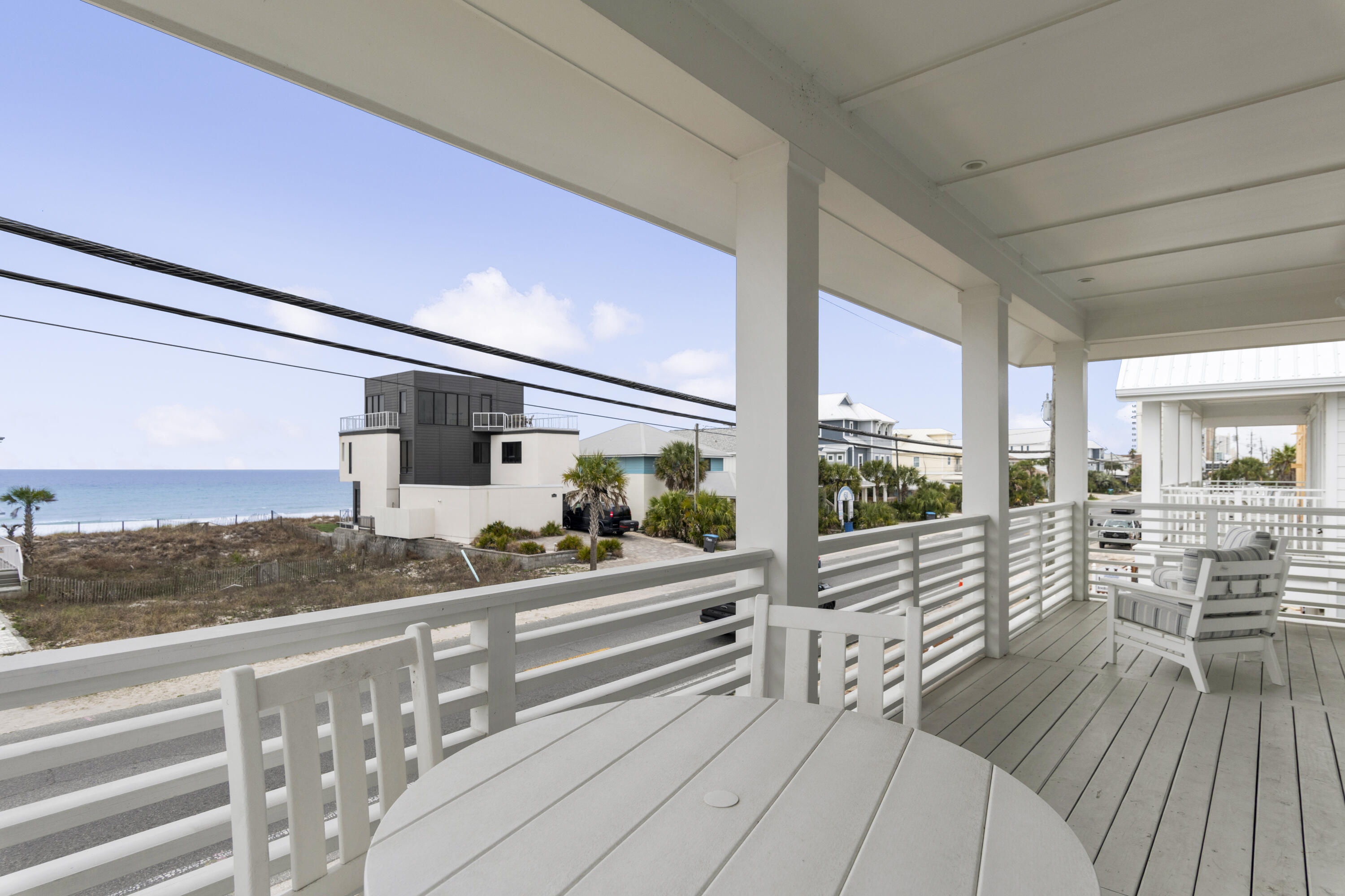 16416 Front Beach Road Panama City Beach, FL 32413 - Photo 25 of 46 a view of a balcony with wooden floor