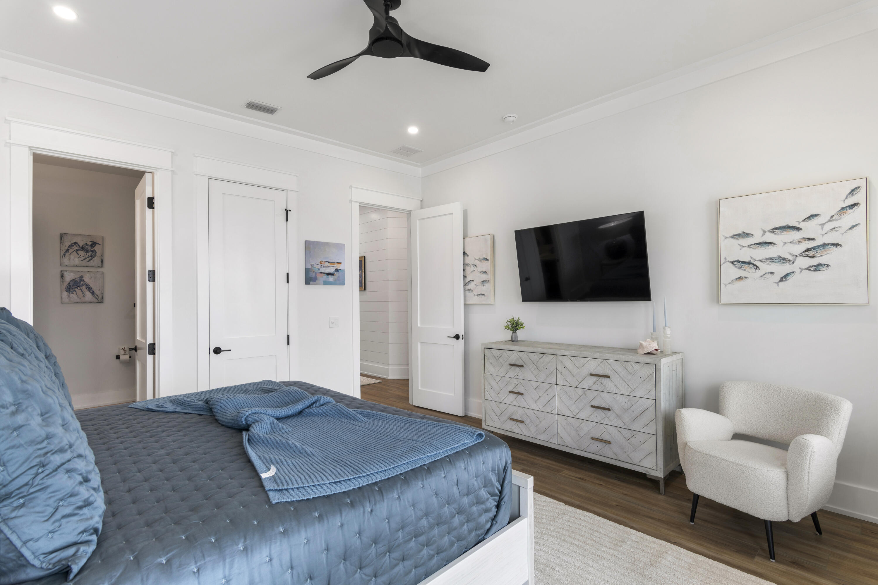 16416 Front Beach Road Panama City Beach, FL 32413 - Photo 27 of 46 a bedroom with a bed and furniture