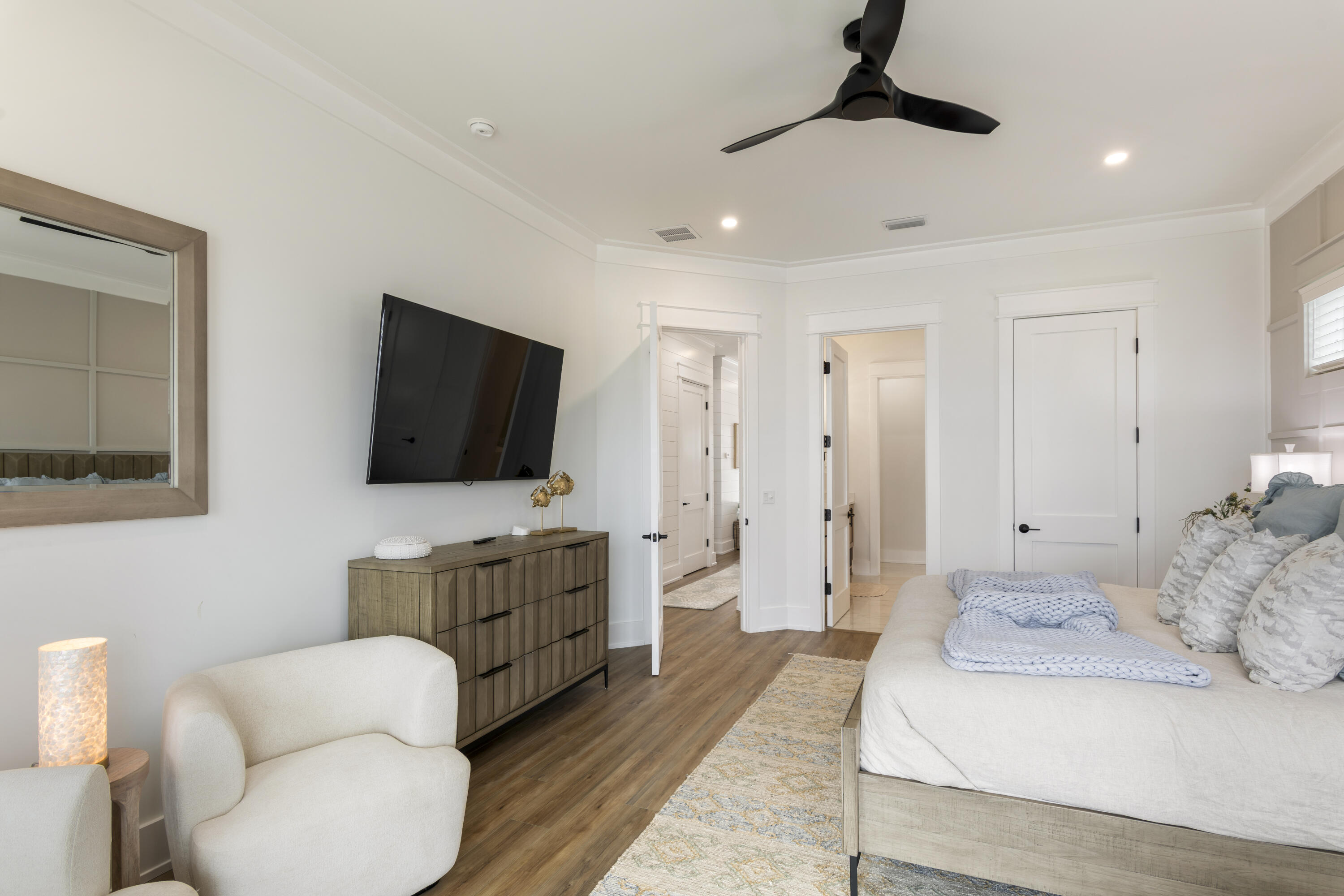 16416 Front Beach Road Panama City Beach, FL 32413 - Photo 32 of 46 a living room with furniture and a flat screen tv
