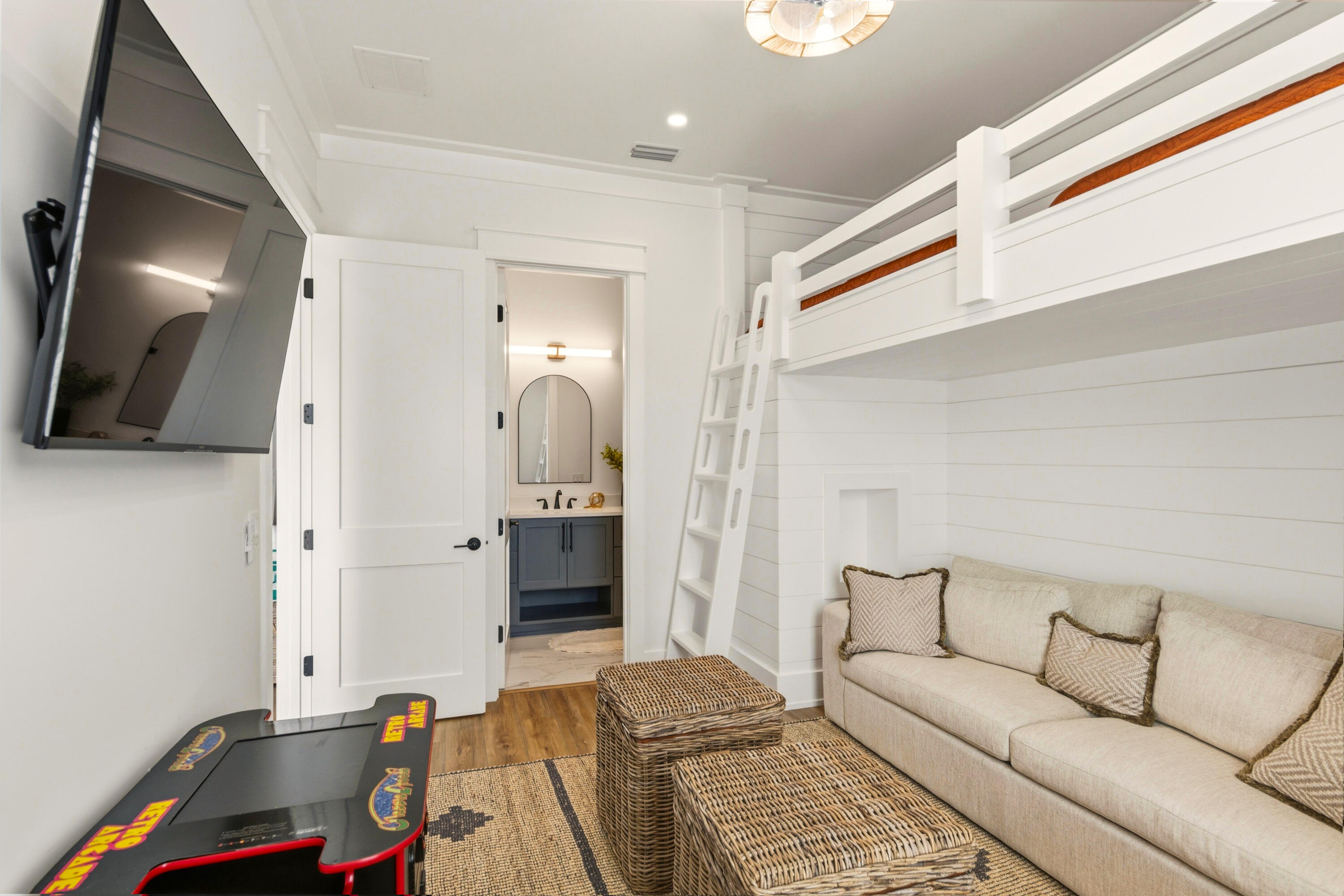 16416 Front Beach Road Panama City Beach, FL 32413 - Photo 36 of 46 a living room with furniture and a flat screen tv