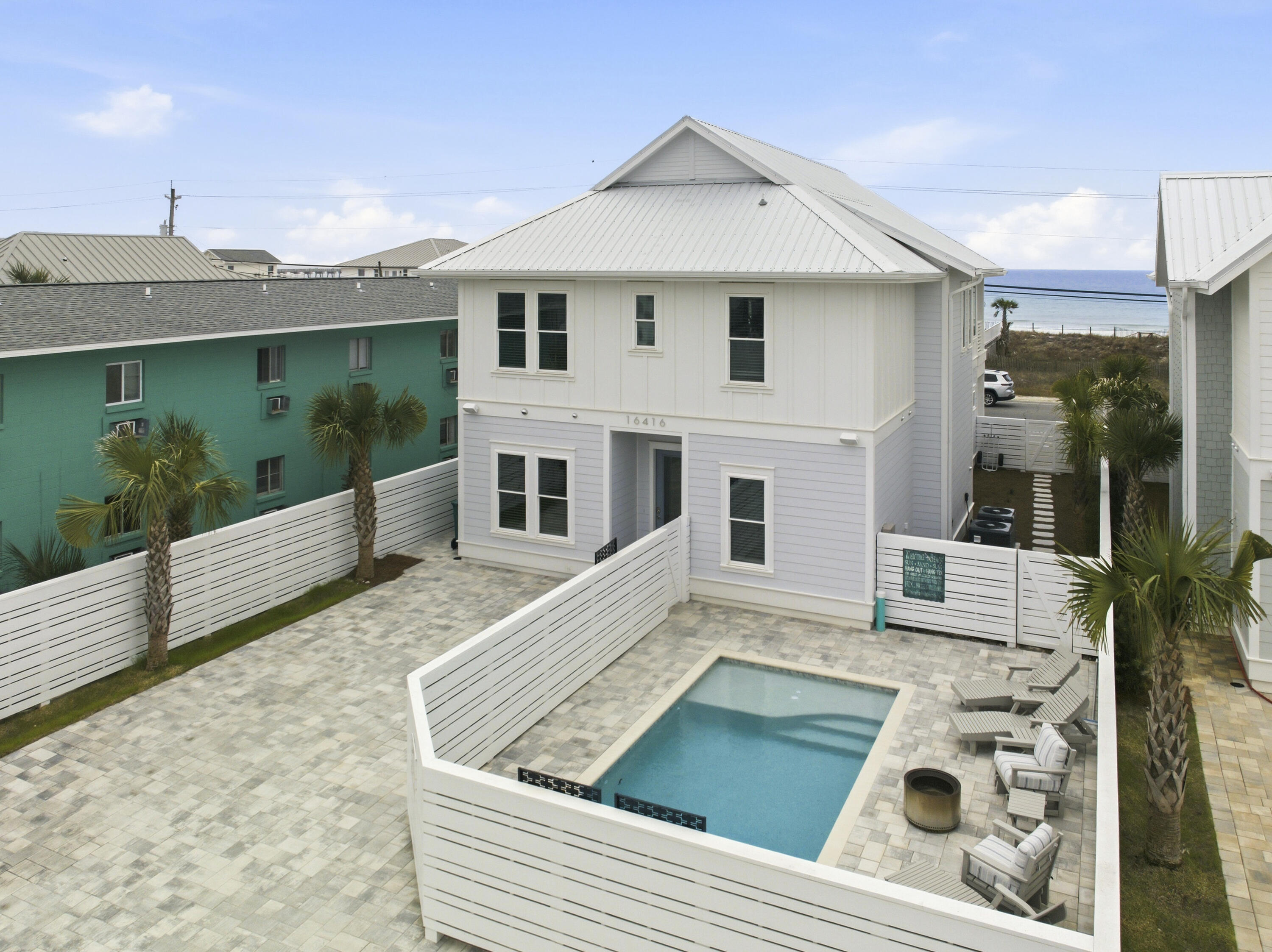 16416 Front Beach Road Panama City Beach, FL 32413 - Photo 4 of 46 a view of a house with backyard