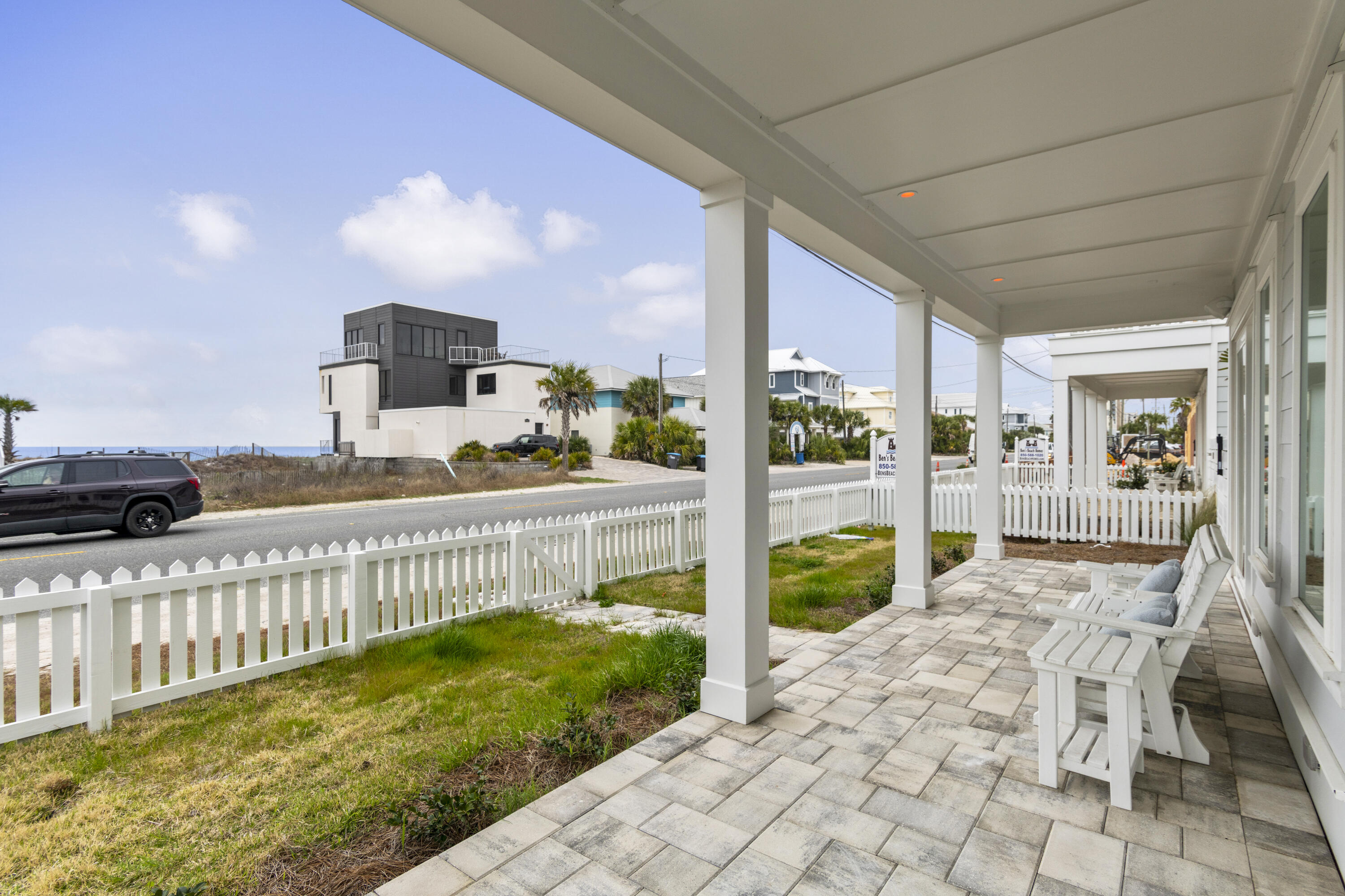 16416 Front Beach Road Panama City Beach, FL 32413 - Photo 41 of 46 a view of a porch with wooden fence