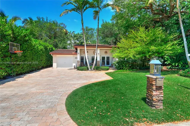 a view of a backyard with a garden