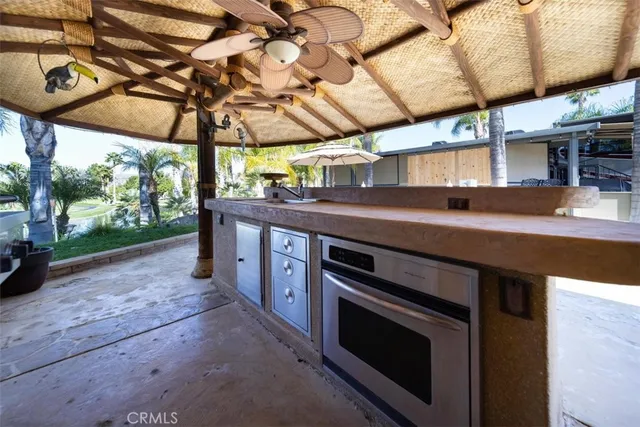 a view of swimming pool with a patio