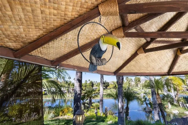 a view of a swimming pool with a patio