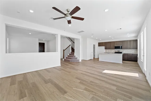a view living room with a sink and cabinet