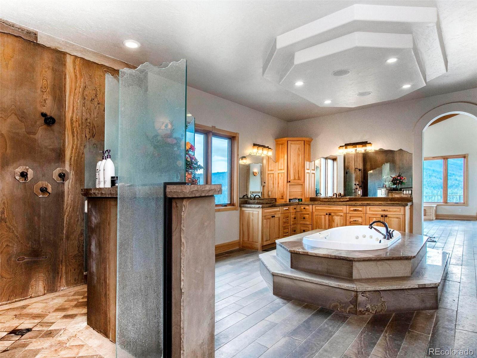 577 Bear Meadow Trail Evergreen, CO 80439 - Photo 20 of 40 a living room with furniture and a table
