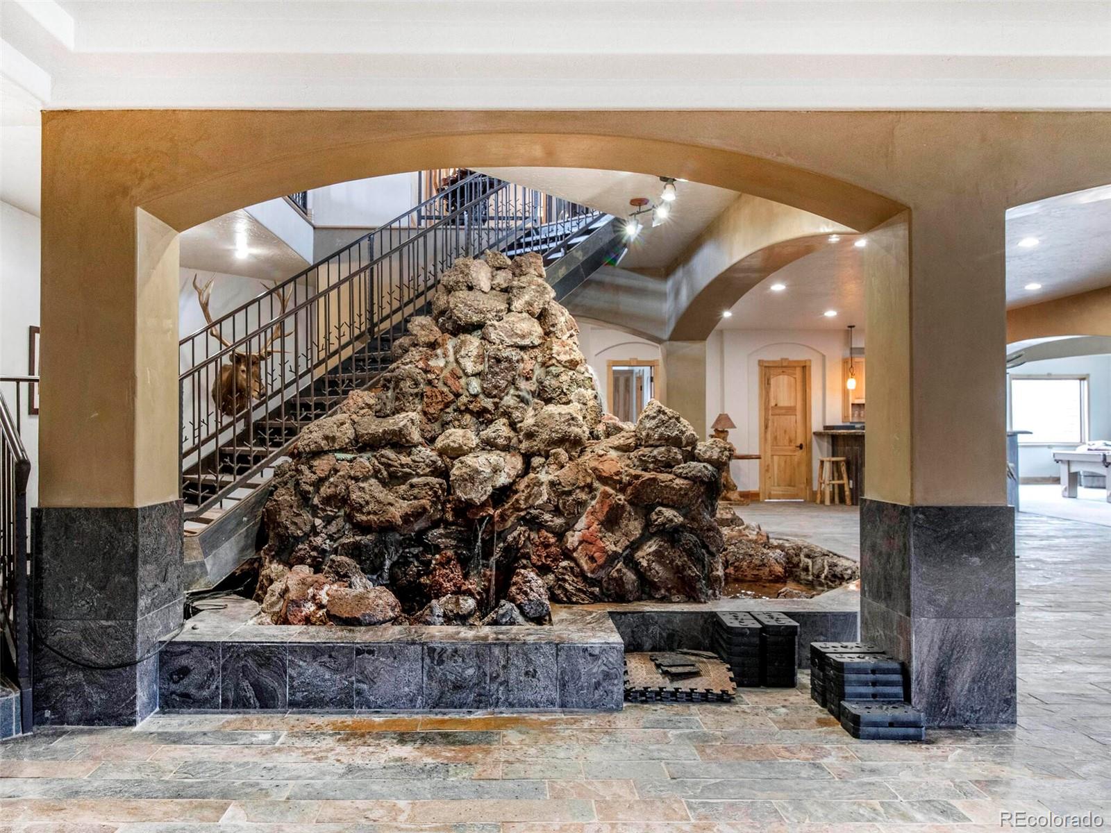 577 Bear Meadow Trail Evergreen, CO 80439 - Photo 24 of 40 a view of entryway with a hall