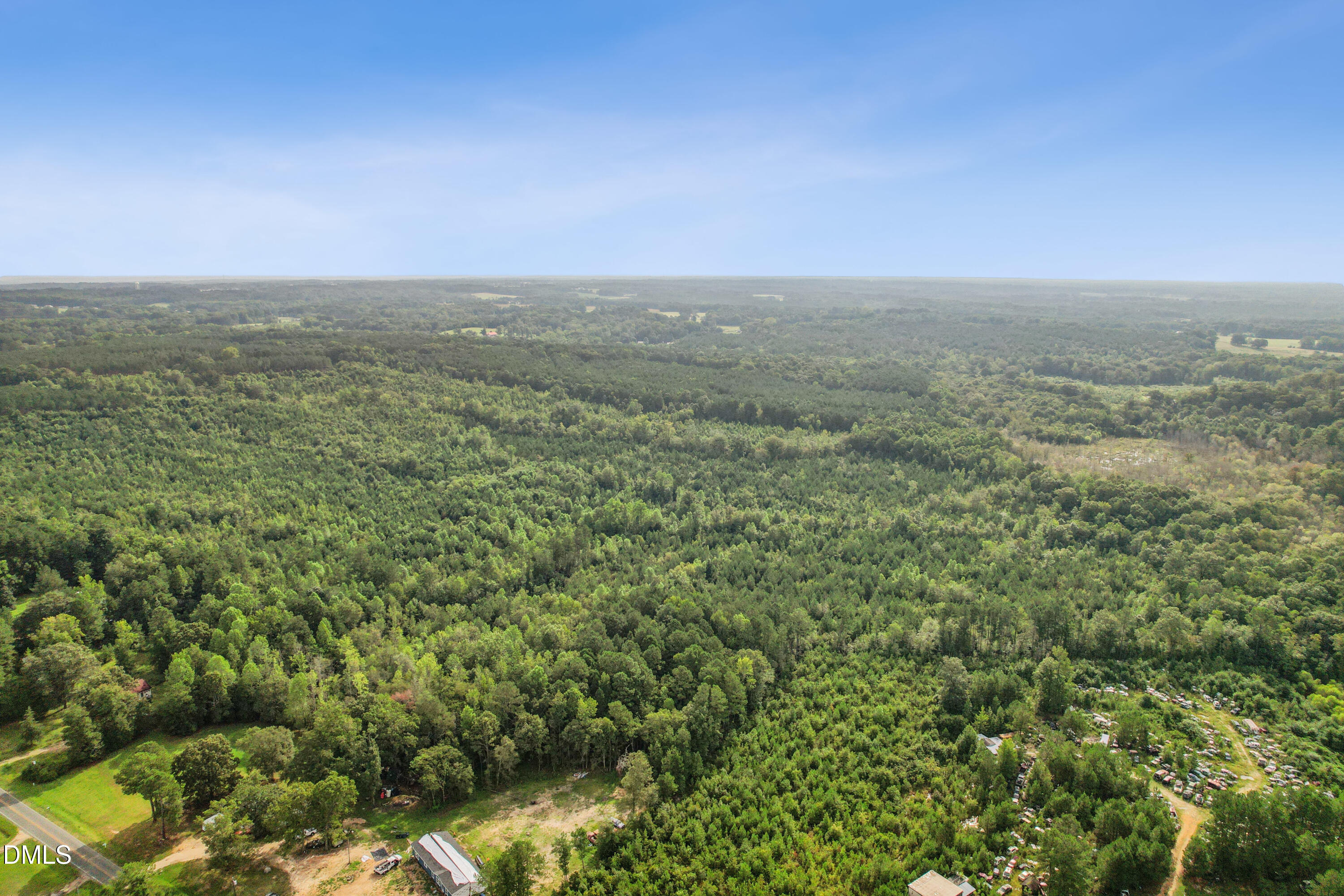 0 McLeod Road Broadway, NC 27505 - Photo 2 of 11 an aerial view of houses covered in trees