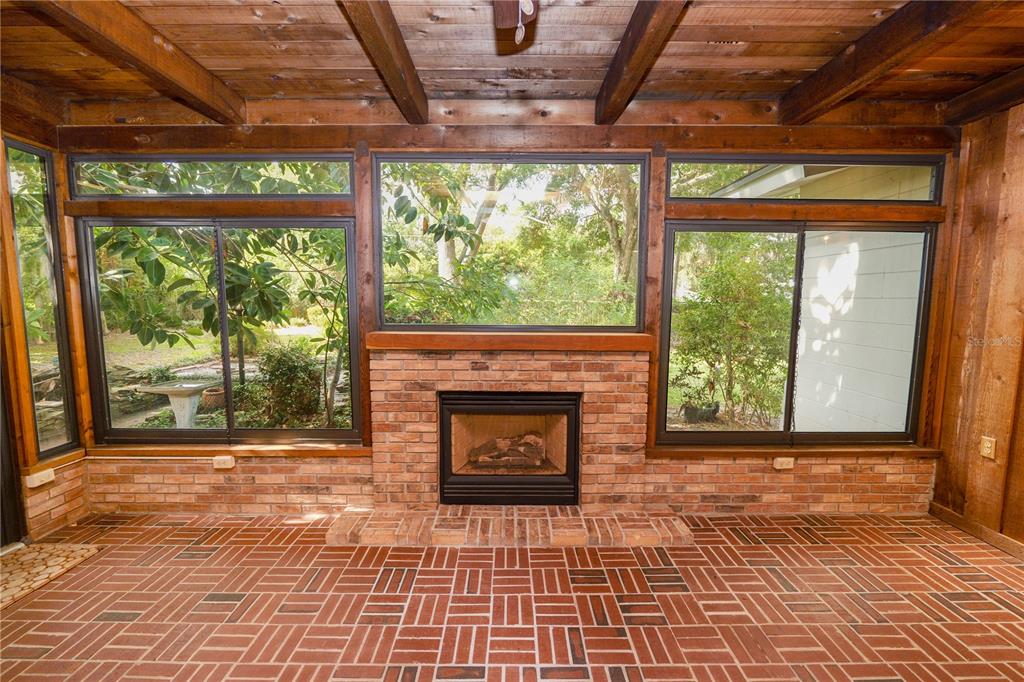 509 Robroy Street Lakeland, FL 33813 - Photo 23 of 51 a view of an empty room with a fireplace and a window