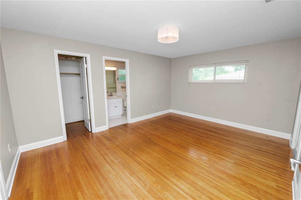 509 Robroy Street Lakeland, FL 33813 - Photo 29 of 51 a view of empty room with wooden floor