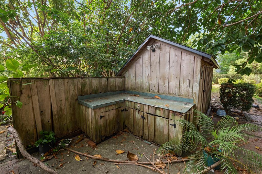 509 Robroy Street Lakeland, FL 33813 - Photo 46 of 51 a view of a house with wooden fence