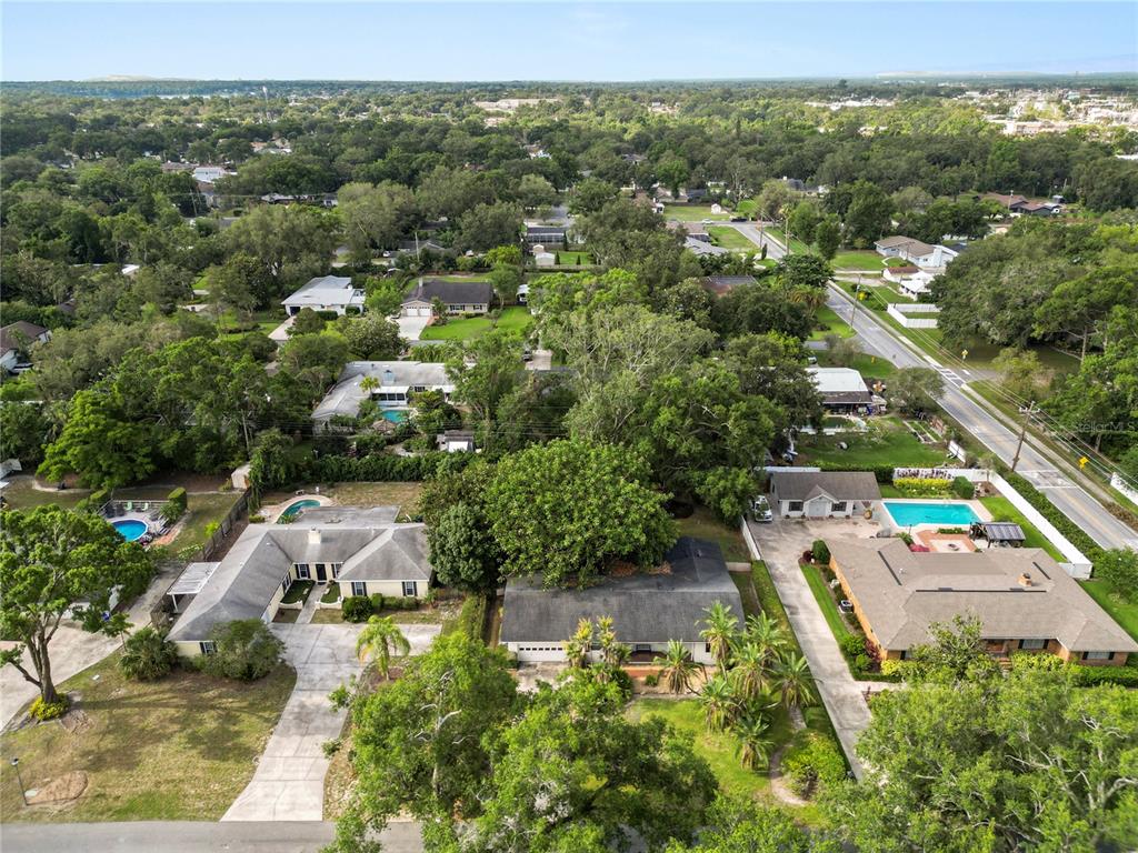 509 Robroy Street Lakeland, FL 33813 - Photo 50 of 51 an aerial view of residential houses with outdoor space and trees
