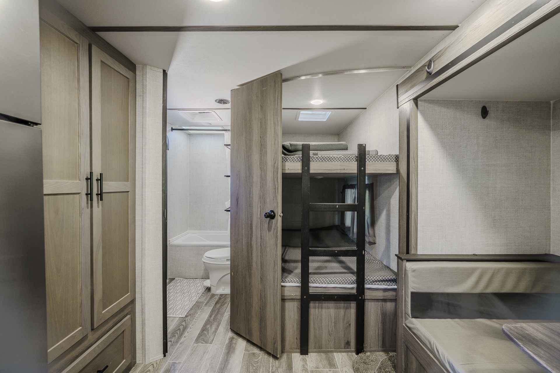 1082 WC PICKETT Road Clifton, TN 38425 - Photo 50 of 75 a bathroom with a glass shower door and a toilet