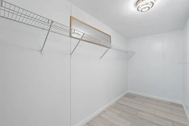 a view of a room with racks on the wall