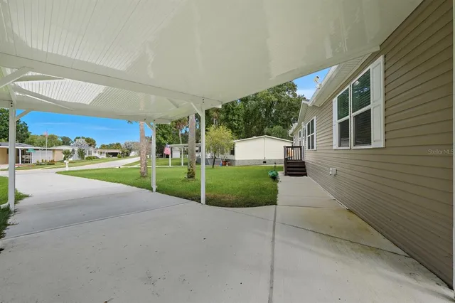 a view of a house with a street