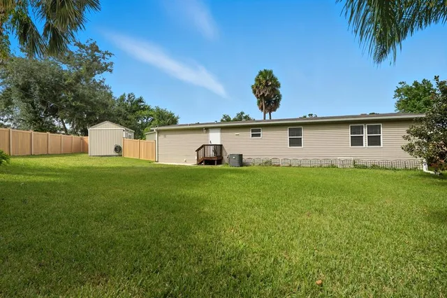 a front view of house with yard and seating area