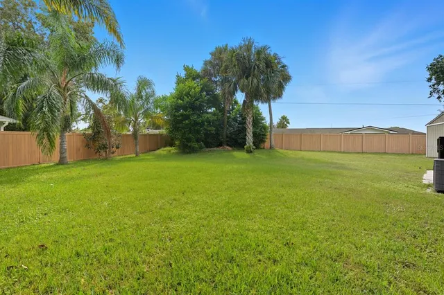 a view of a backyard of a house