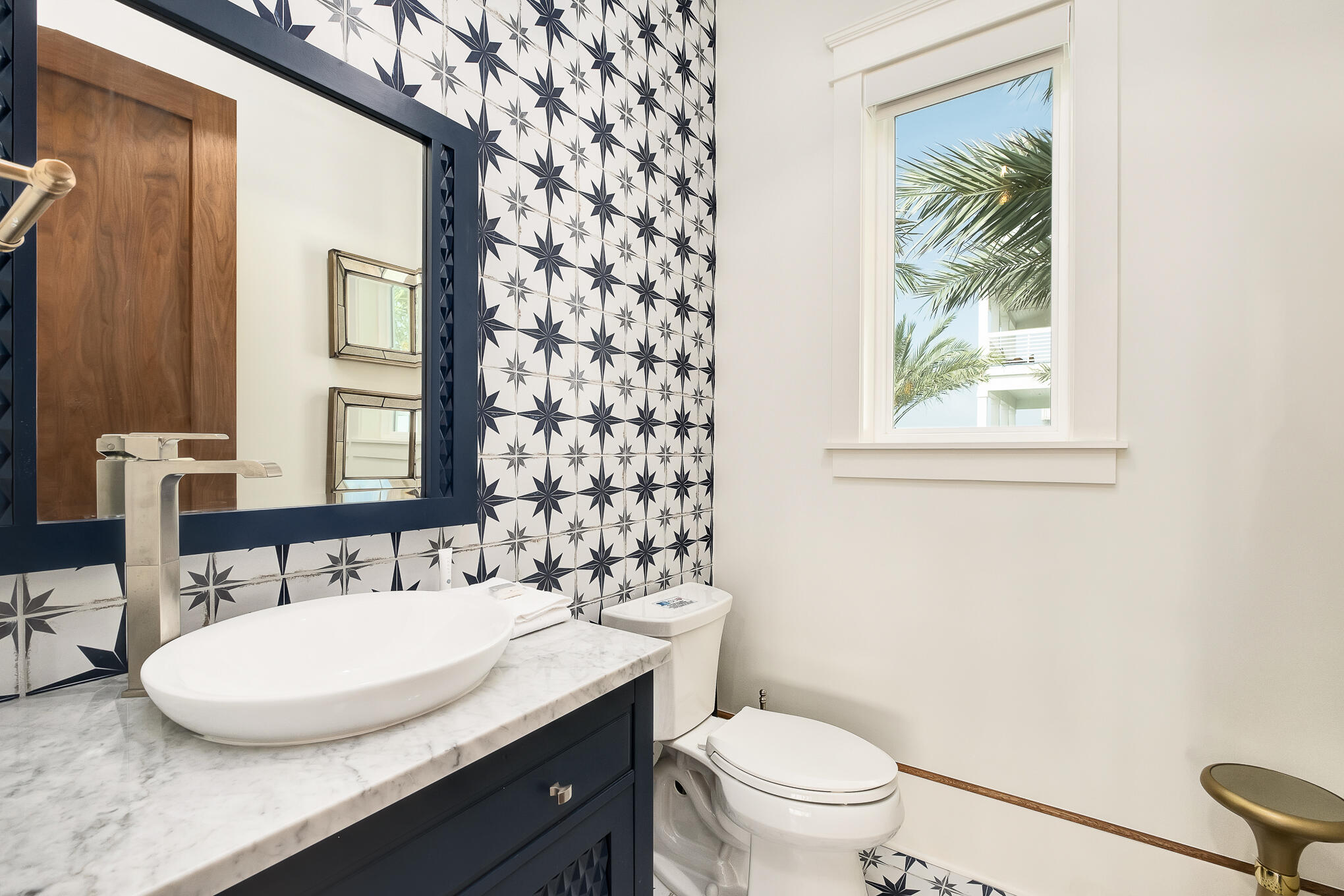 26 Palm Ct Lane Inlet Beach, FL 32461 - Photo 23 of 43 a bathroom with a granite countertop sink a toilet and a mirror