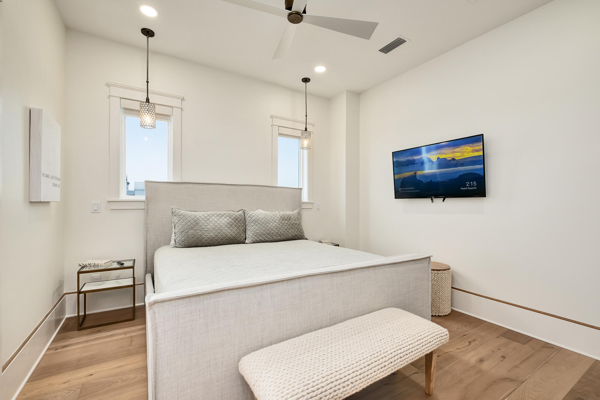 26 Palm Ct Lane Inlet Beach, FL 32461 - Photo 30 of 43 a bedroom with a bed and a flat screen tv