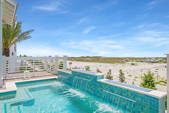 a view of a balcony with lake view and mountain view