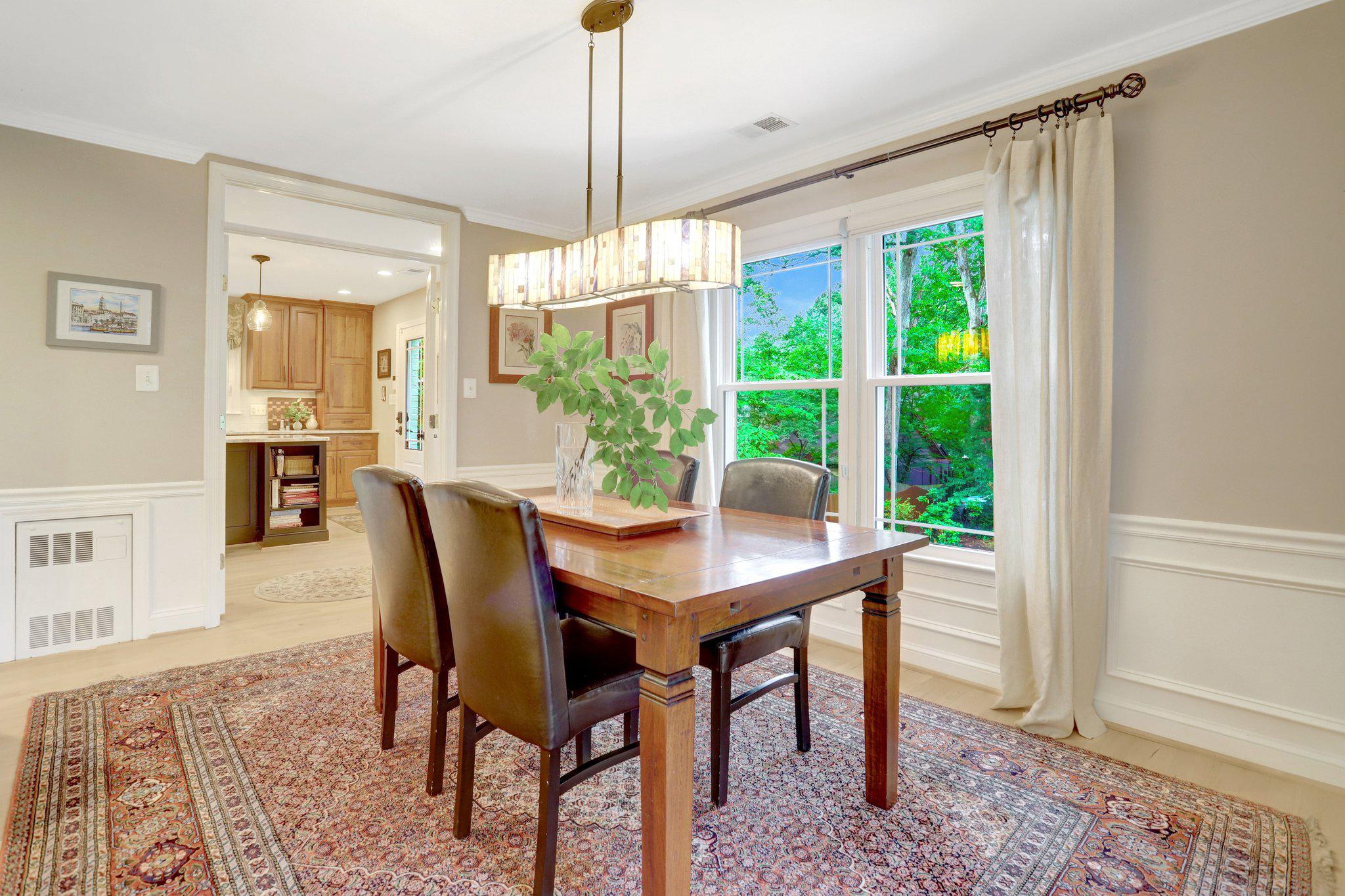 7506 Oriole Avenue Springfield, VA 22150 - Photo 8 of 67 a view of a dining room with furniture window and wooden floor