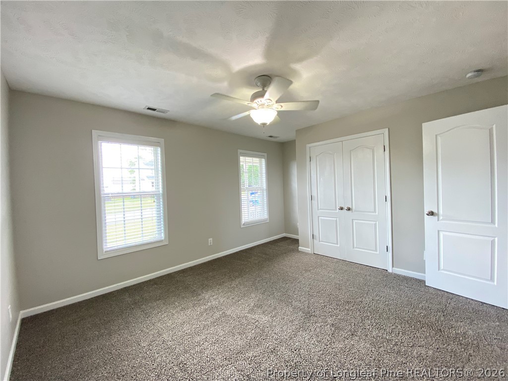 58 Polk Street Spring Lake, NC 28390 - Photo 21 of 26 a view of an empty room with a window