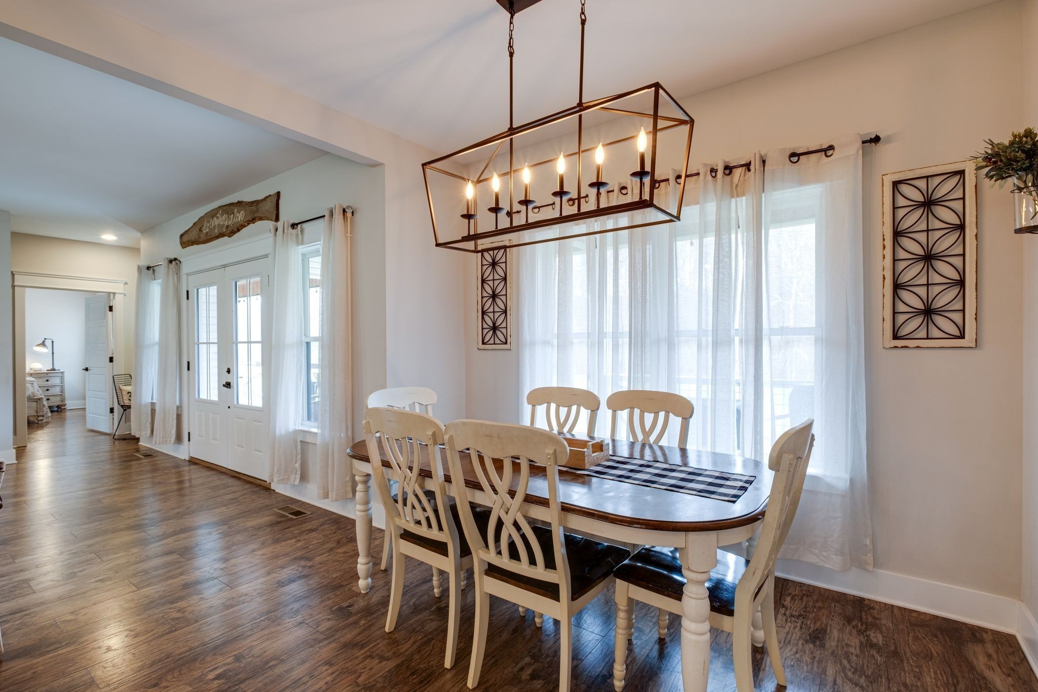 1227 Stayton Road Cumberland Furnace, TN 37051 - Photo 23 of 70 a view of a dining room with furniture window and wooden floor